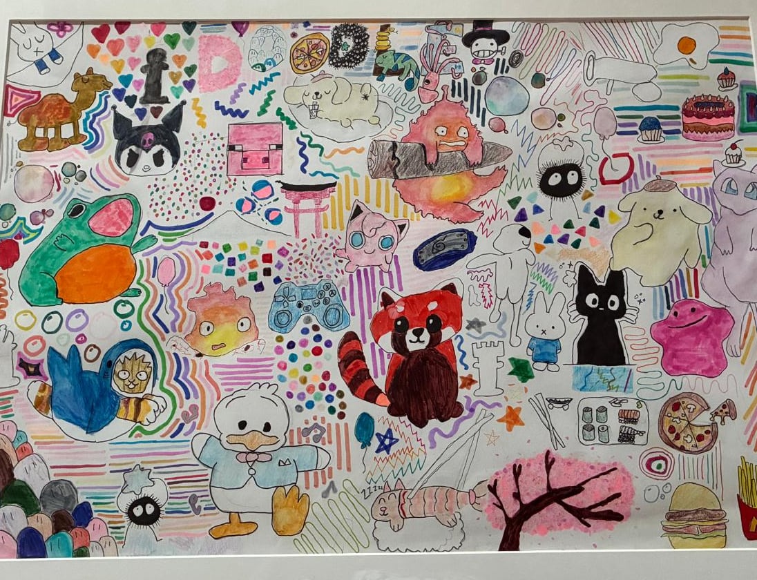 Our framed doodle piece: a whole page packed with little characters, food and patterns in felt tip and watercolour